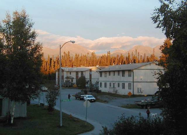 Sunset accentuates the autumn colors in my neighorhood, with Chugach range in the background