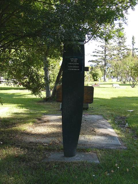 Propeller blade being used as a grave marker. The inscription reads:<BR><BR>Alonzo Cope<BR>1897 - 1939<BR>Pioneeer Aviator<BR>Alaska Wing OX-5<BR>Aviation Pioneers