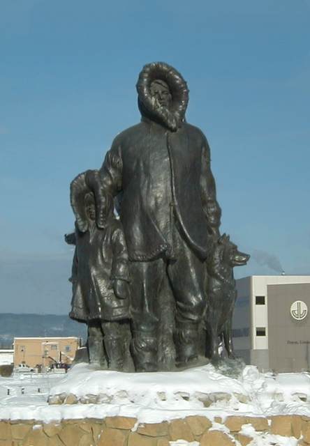 The First Unknown Family statue in downtown Fairbanks