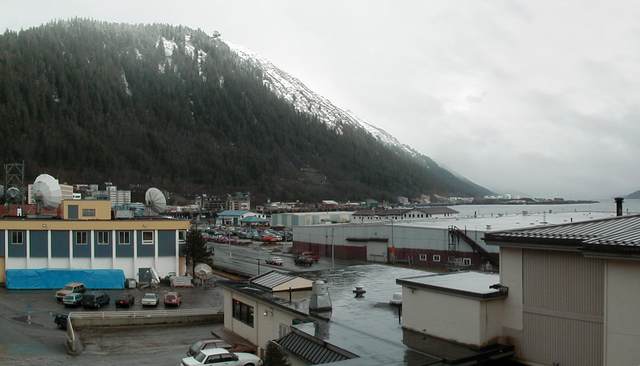 Looking south over the Gastineau Channel from my hotel window. The ruins of the old Juneau Mine can be seen on the mountainside above the cruise ship docks.