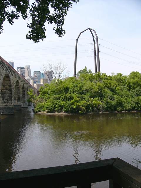 Another view of one of those power line towers with the Stone Arch Bridge and downtown
