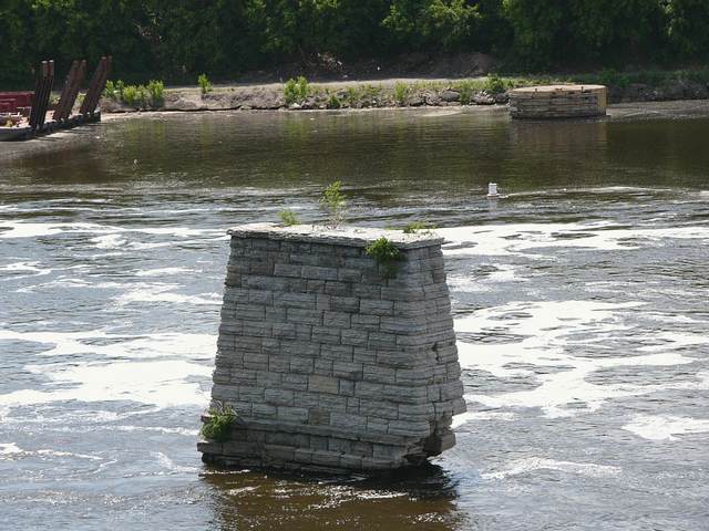 The remnants of an older and now defunct bridge (or something) just downriver of the Stone Arch Bridge.