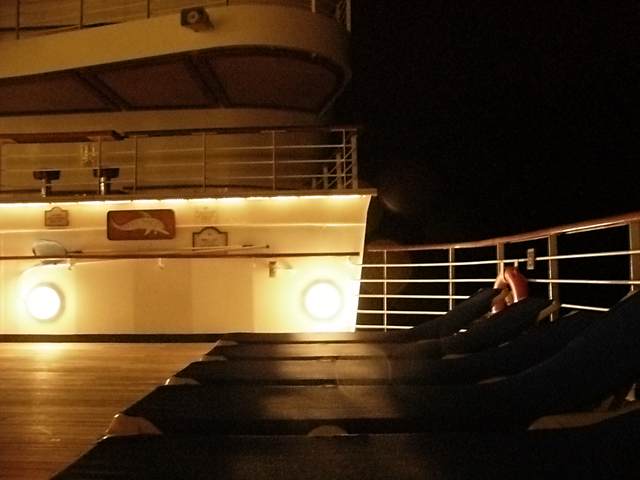 Aft deck loungers at night.