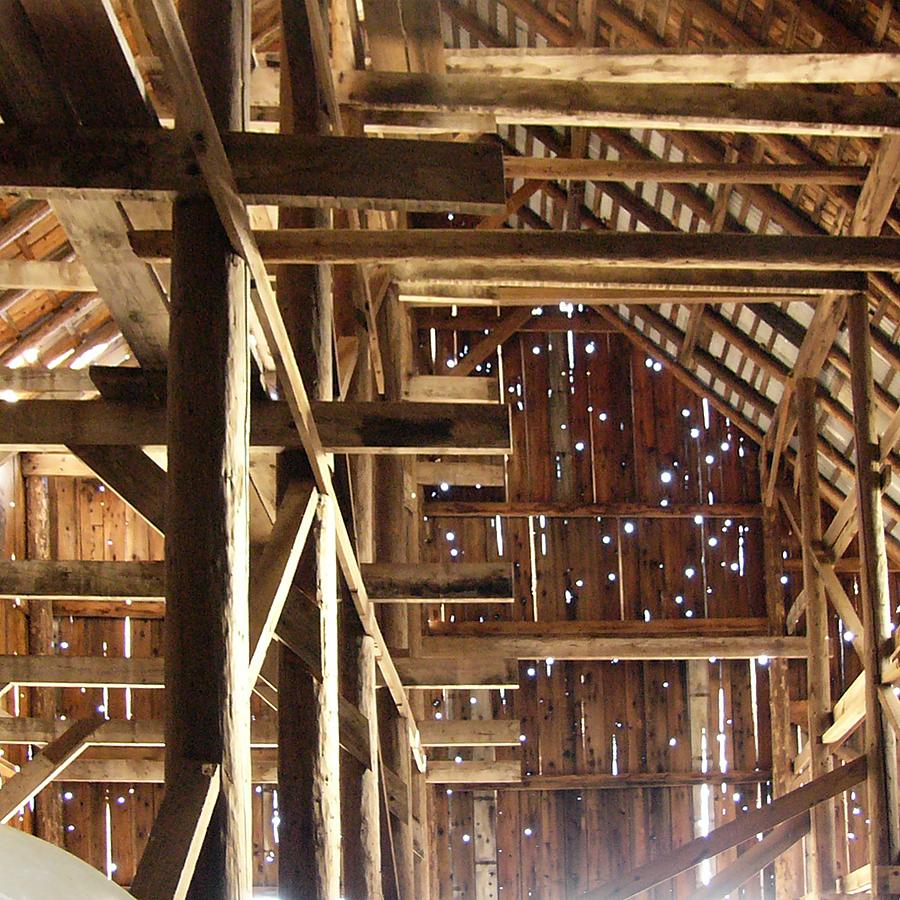 Inside the barn, looking up at the ceiling.
