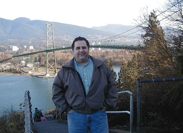 Bob in front of Lions Gate Bridge and North Vancouver