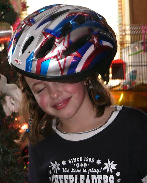 My niece, Cassidy, tries out her new bike helmet